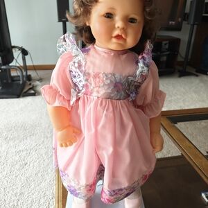 Charming Pink Doll with Purple Accents